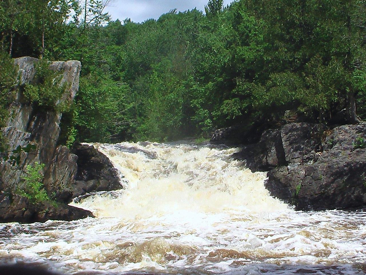 LaSalle Falls is a 20-foot slide falls that can be reached via a one-mile hike through a forest near Florence, WI.