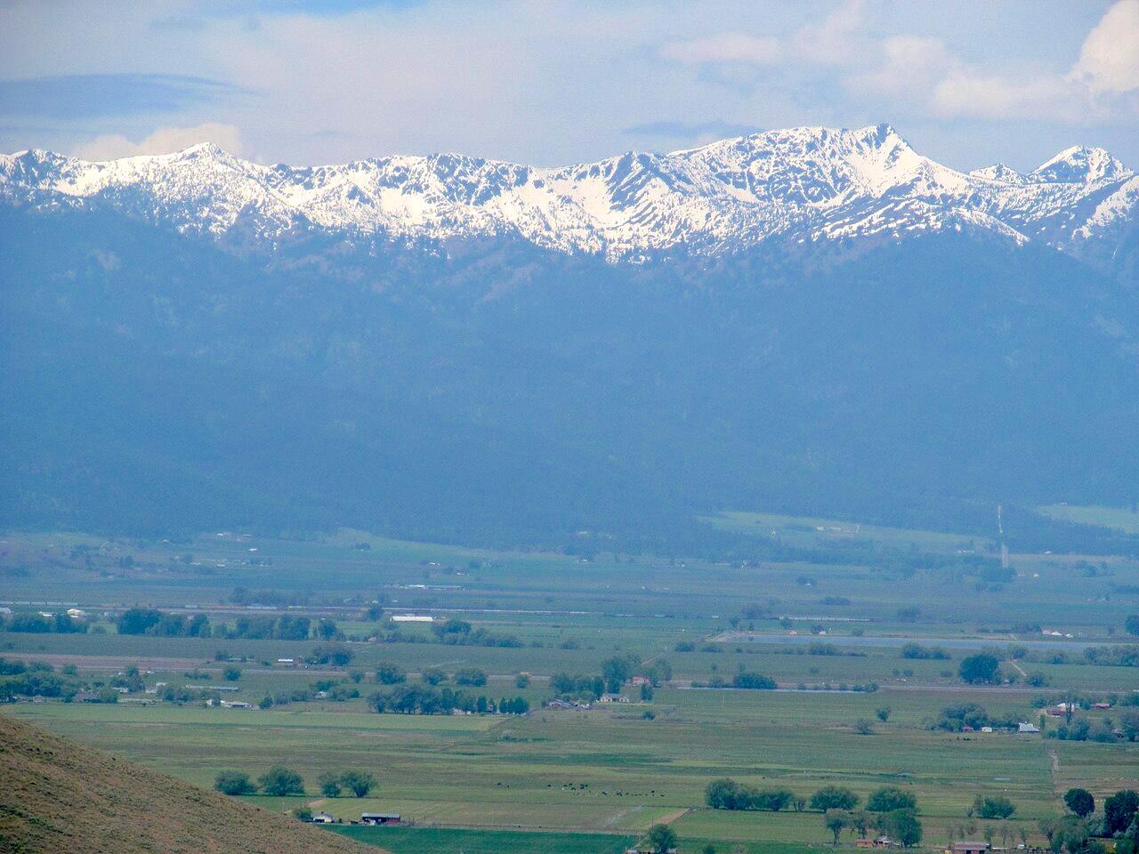 Baker City, Oregon, with the Blue Mountains (specifically the Elkhorn Mountains sub-range) in the background