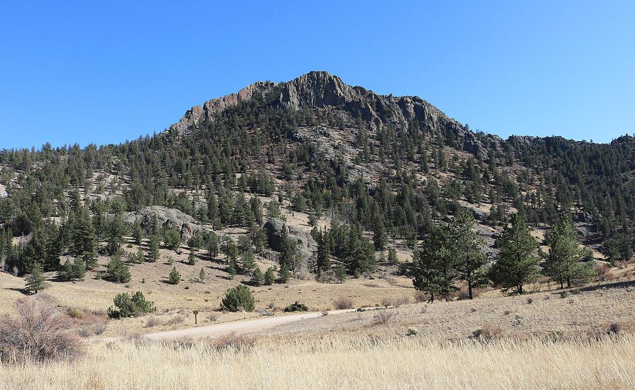 Castle Rock, a mountain in Chaffee County, Colorado. The view is from a spot near County Road 187. The mountain is composed of Wall Mountain tuff.