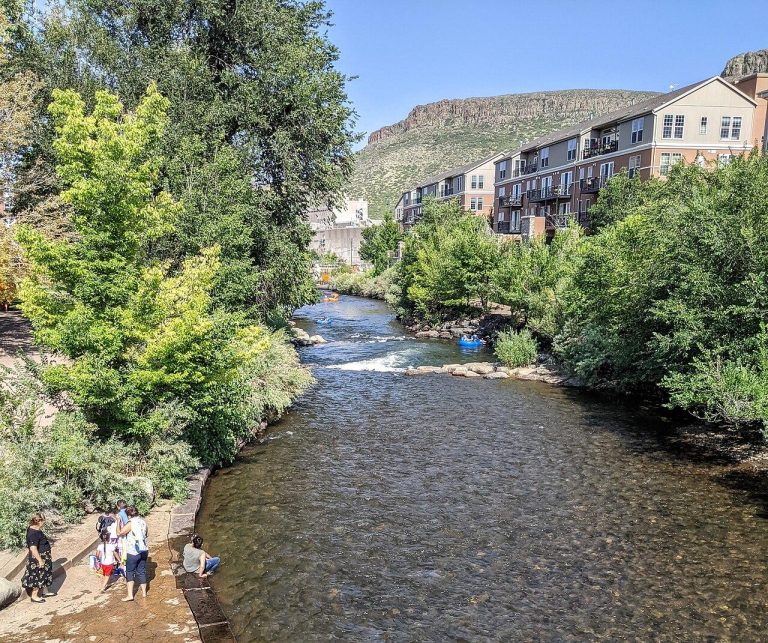 Clear Creek in Golden, Colorado, with South Table Mountain and tubers.