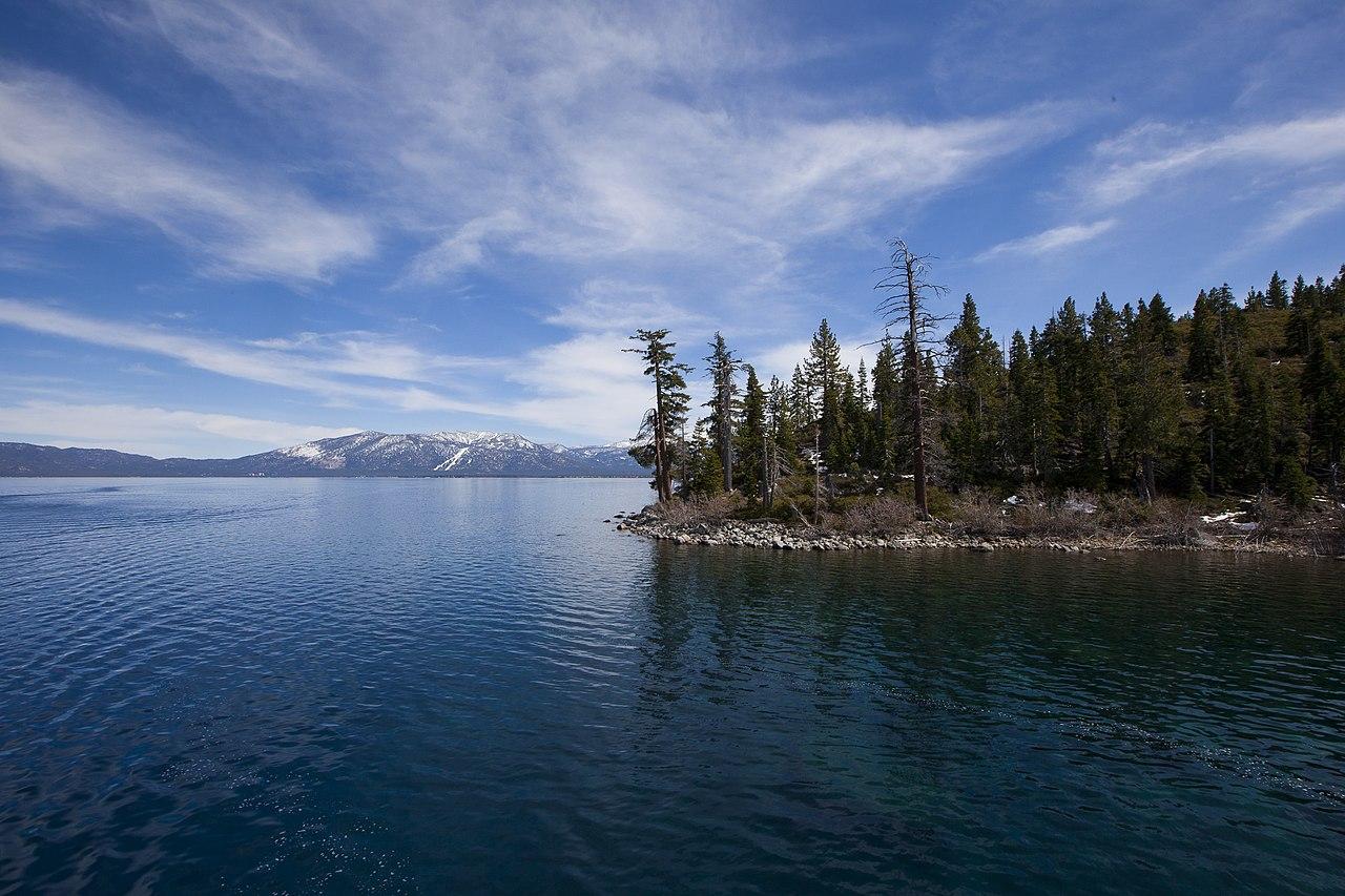 Image of the South Shore of the Lake from the West Shore. Heavenly Valley's ski runs can be seen quite clearly, as can just a bit of Job's Peak on the right.