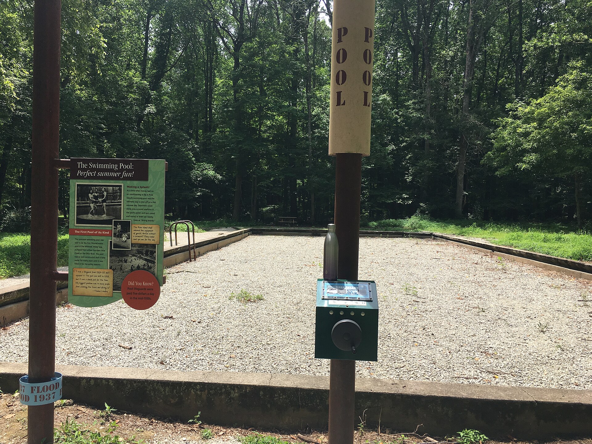 Ruins and interpretive signs at the former Rose Island swimming pool in Charlestown State Park
