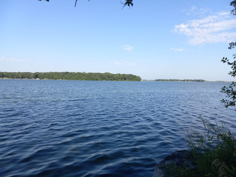 Open water and forested shoreline at Pomme de Terre Lake